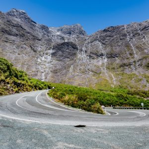 Scenic view of the road to Milford Sound with points of interest marked, perfect for planning a road trip in New Zealand