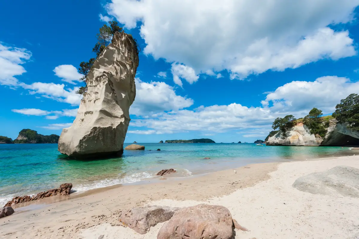 Scenic view of the Coromandel Peninsula, highlighting its picturesque coastline and lush greenery.