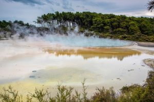 Stunning view of the colorful geothermal landscape in Wai-O-Tapu, a popular tourist destination in New Zealand